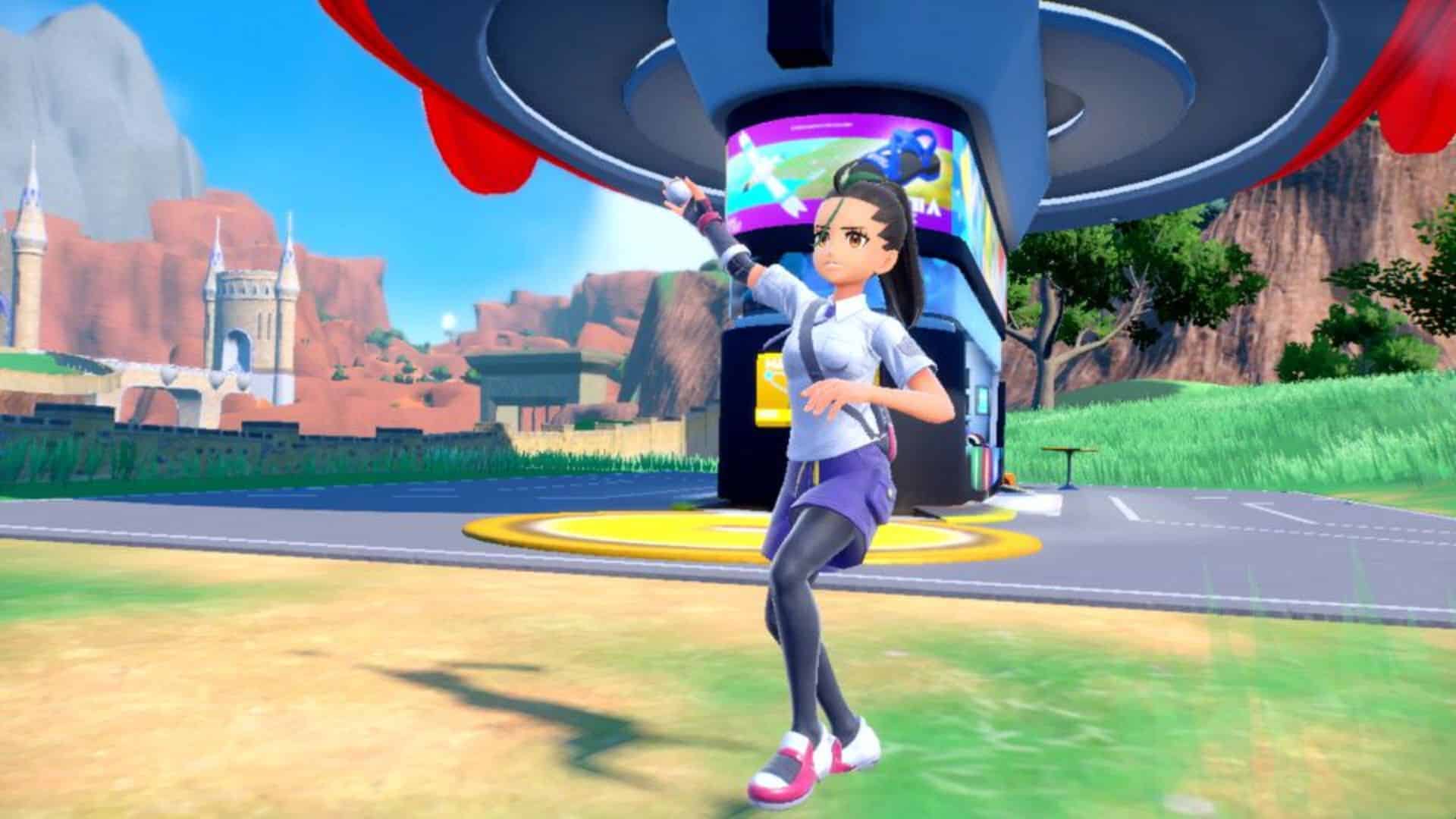 Trainer wirft Pokeball in der Nähe von Poke Center in Pokémon Scharlachrot und Violett